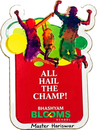 Magnet with jumping figures reading All Hail the Champ!, Bhashyam Blooms School, labelled Master Hariswar