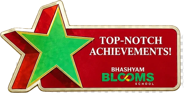 Red star-shaped magnet reading Top-Notch Achievements!, Bhashyam Blooms School