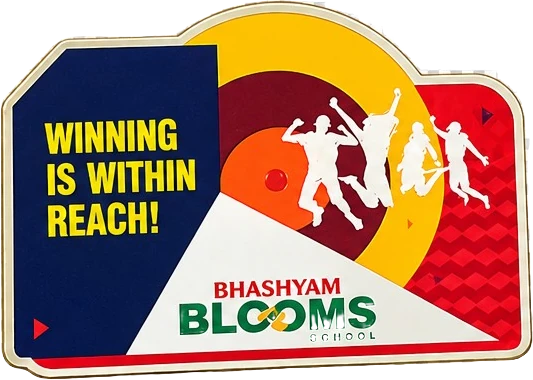 Navy, yellow and red magnet reading Winning Is Within Reach!, Bhashyam Blooms School